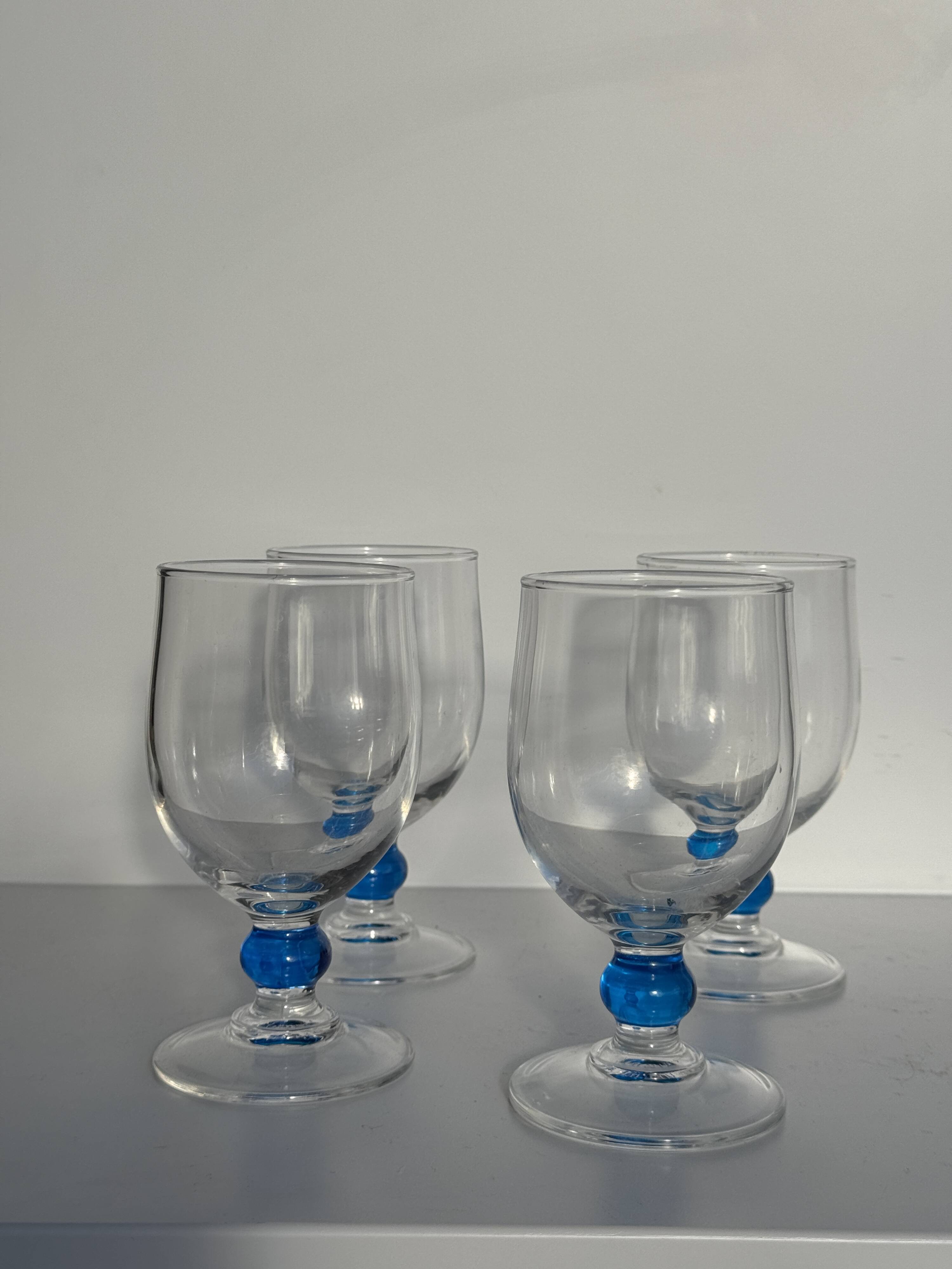 Set of 4 blue ball stemmed water glasses