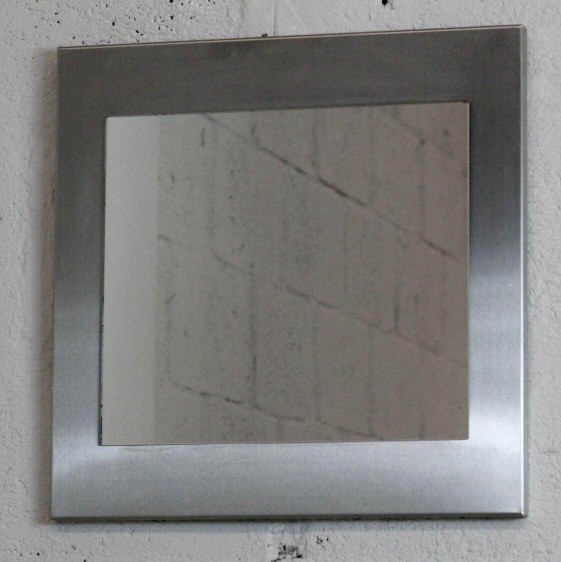 Mirror "space age". Stainless steel. France, circa 1970