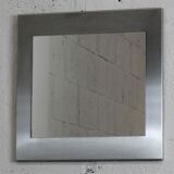Miroir "space age". Acier inoxydable. France, circa 1970
