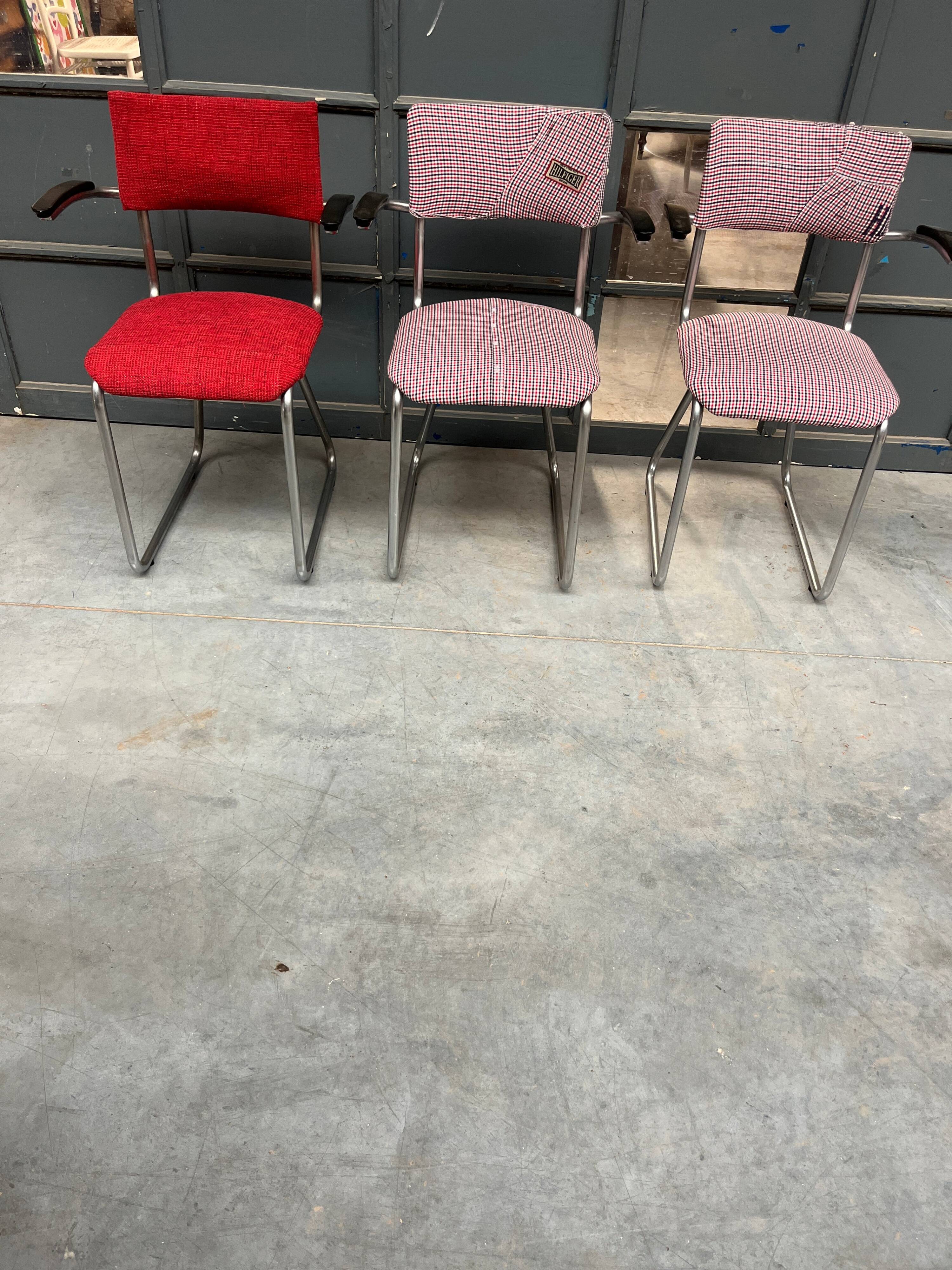 Set of 3 vintage cantilever chairs reupholstered.