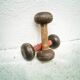 Pair of vintage dumbbells in cast iron and wood