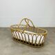 Vintage rattan bassinet