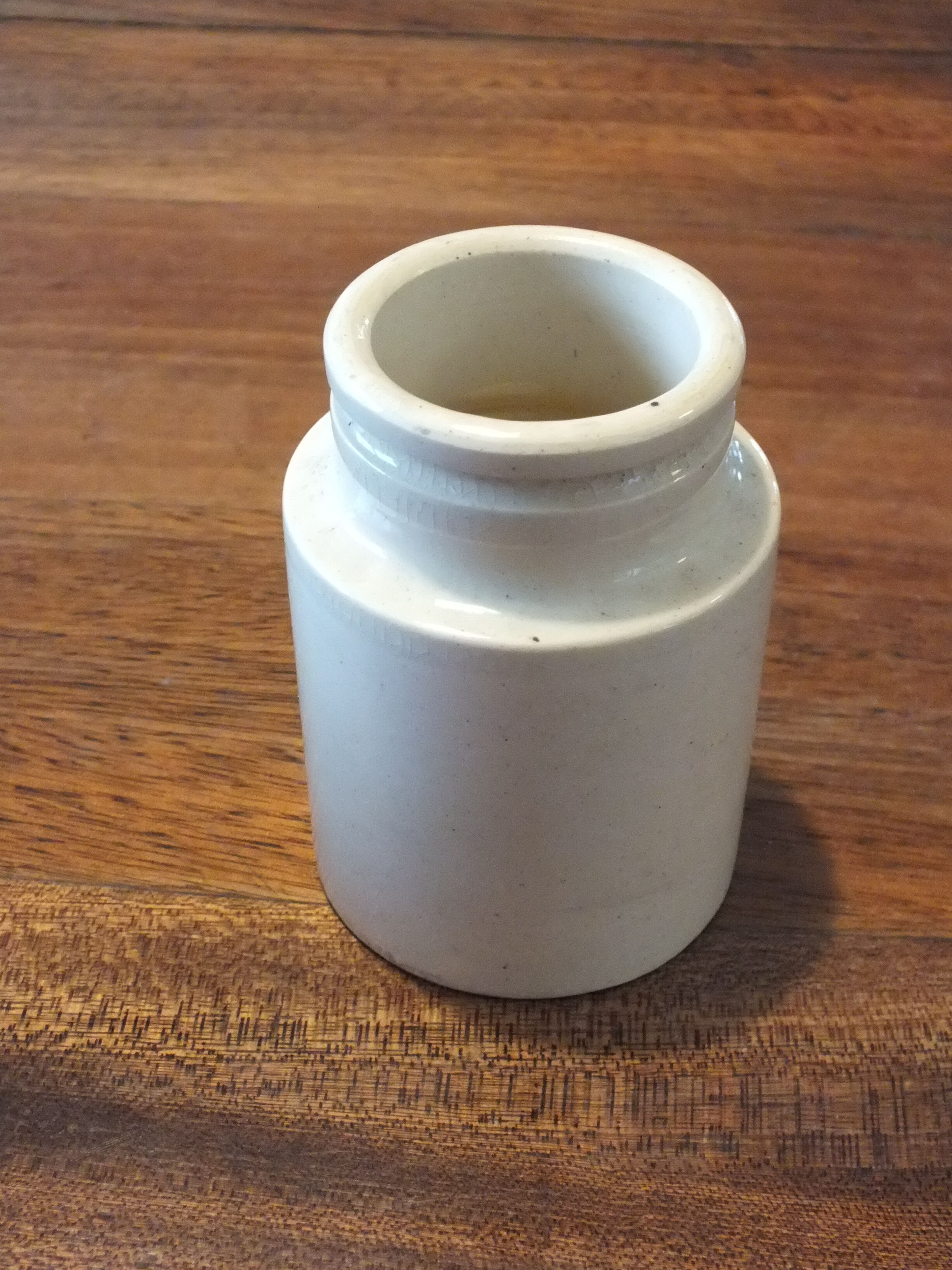 Old creamy white ceramic mustard pot