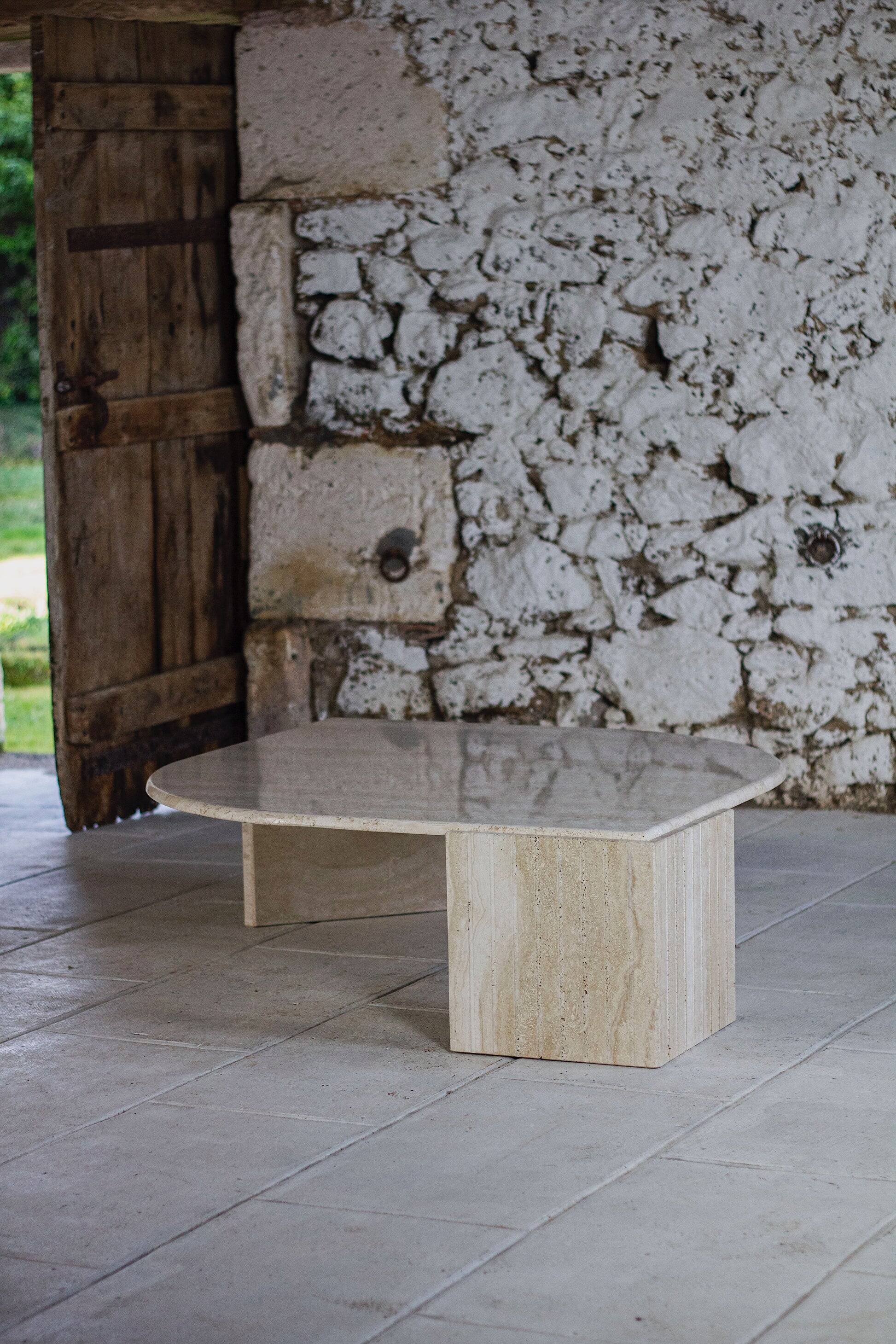 Travertine coffee table "Eye" or "drop" by Roche Bobois, 1980