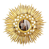 Sun mirror in wood and gilded stucco