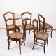 Set of 5 old cane chairs.
