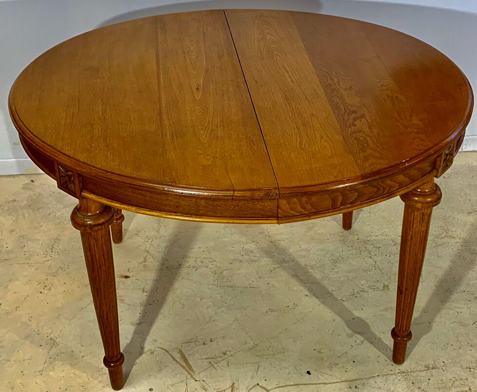 Louis XVI style table in oak with three extensions