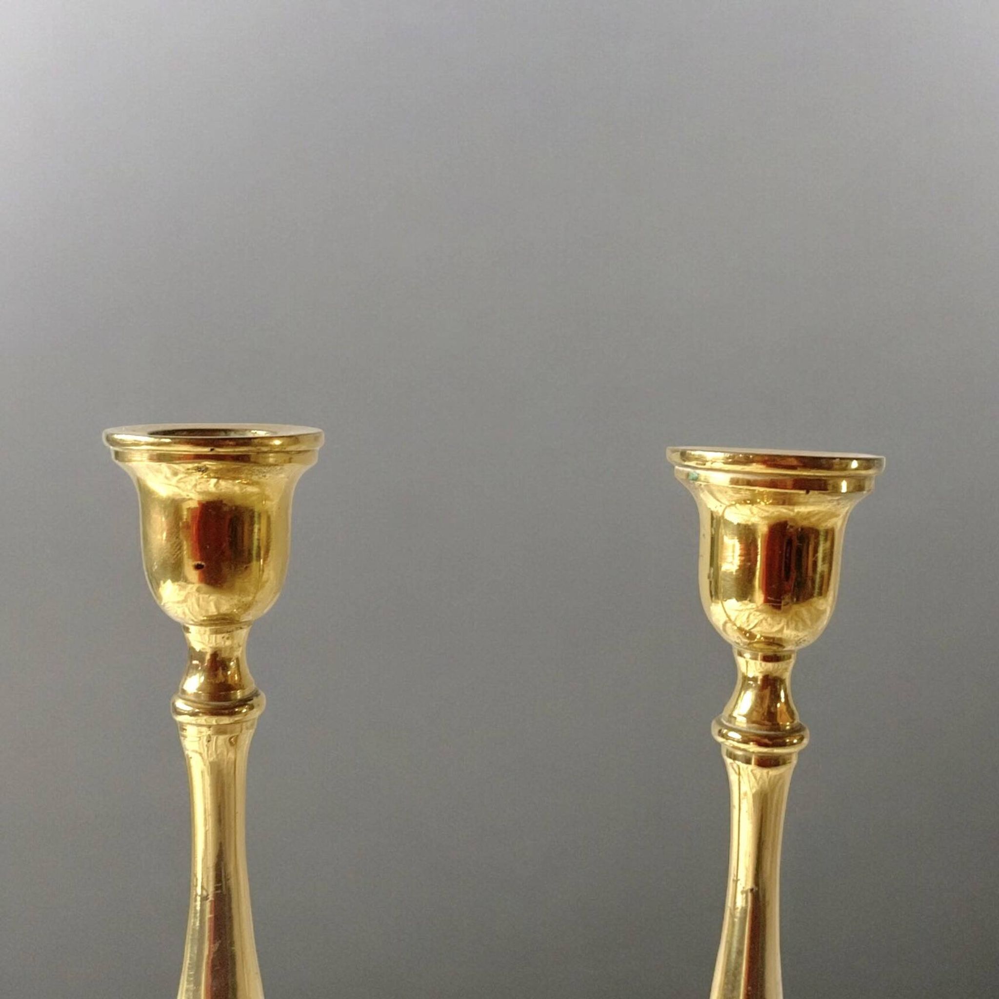 Pair of antique brass candlesticks