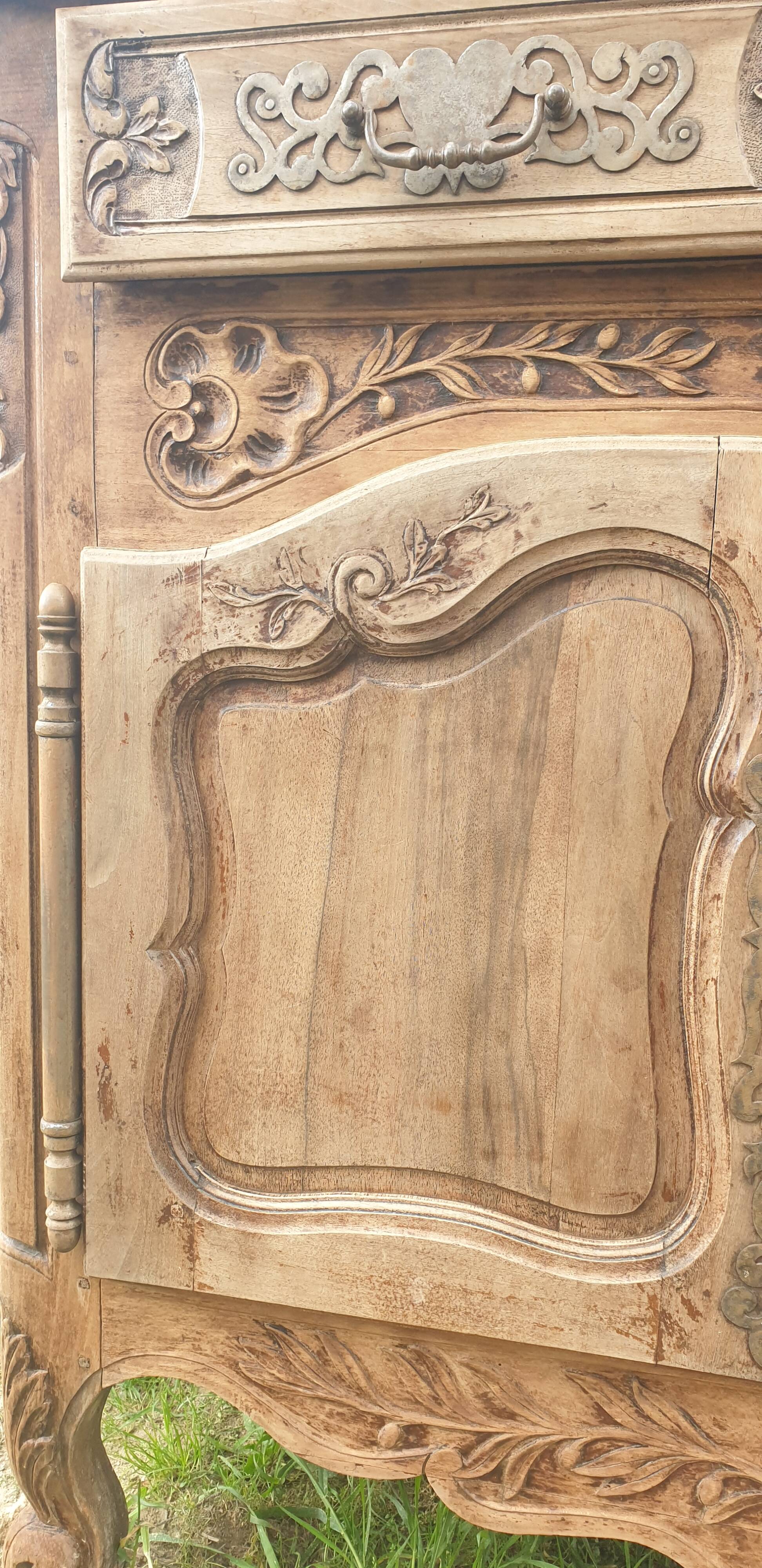 Provencal furniture in finely carved light walnut with wrought ironwork