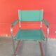Pair of faux leather and chrome armchairs