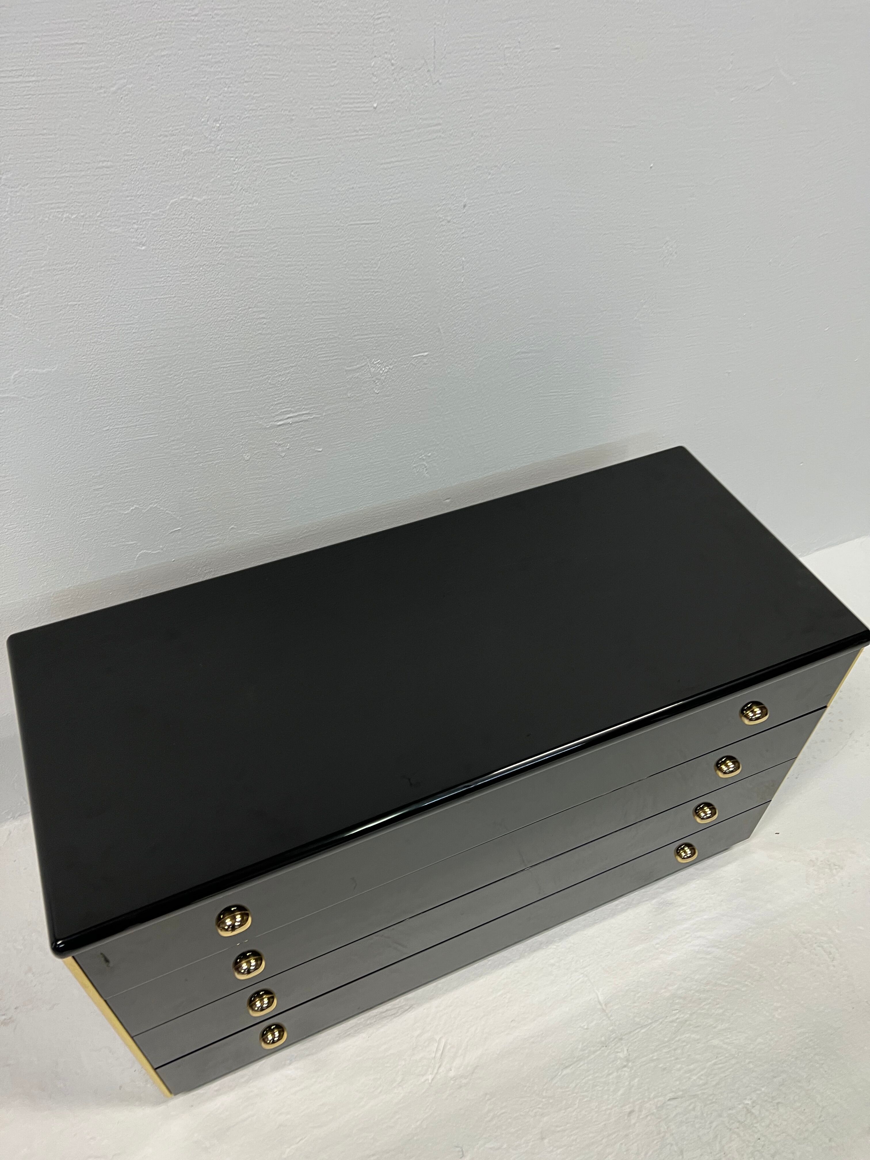 Black lacquered chest of drawers