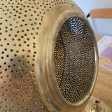 Perforated metal chandelier