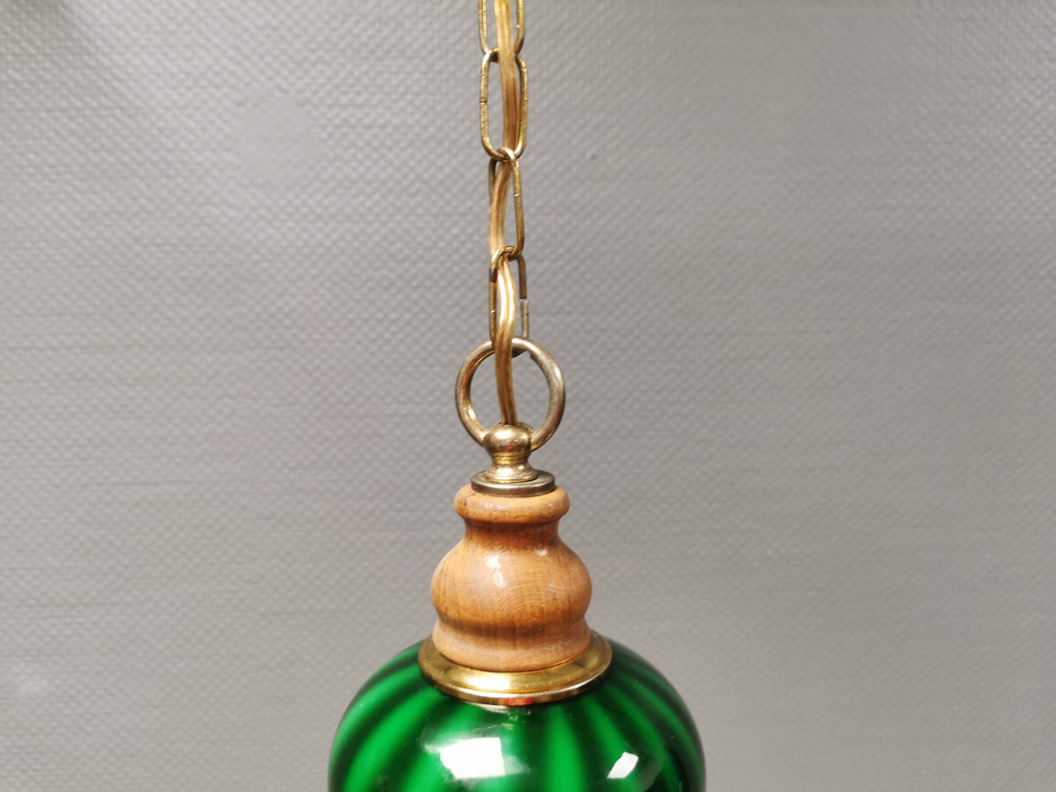 green hanging lamp in double layer glass (white inside) with wooden top and safety chain,