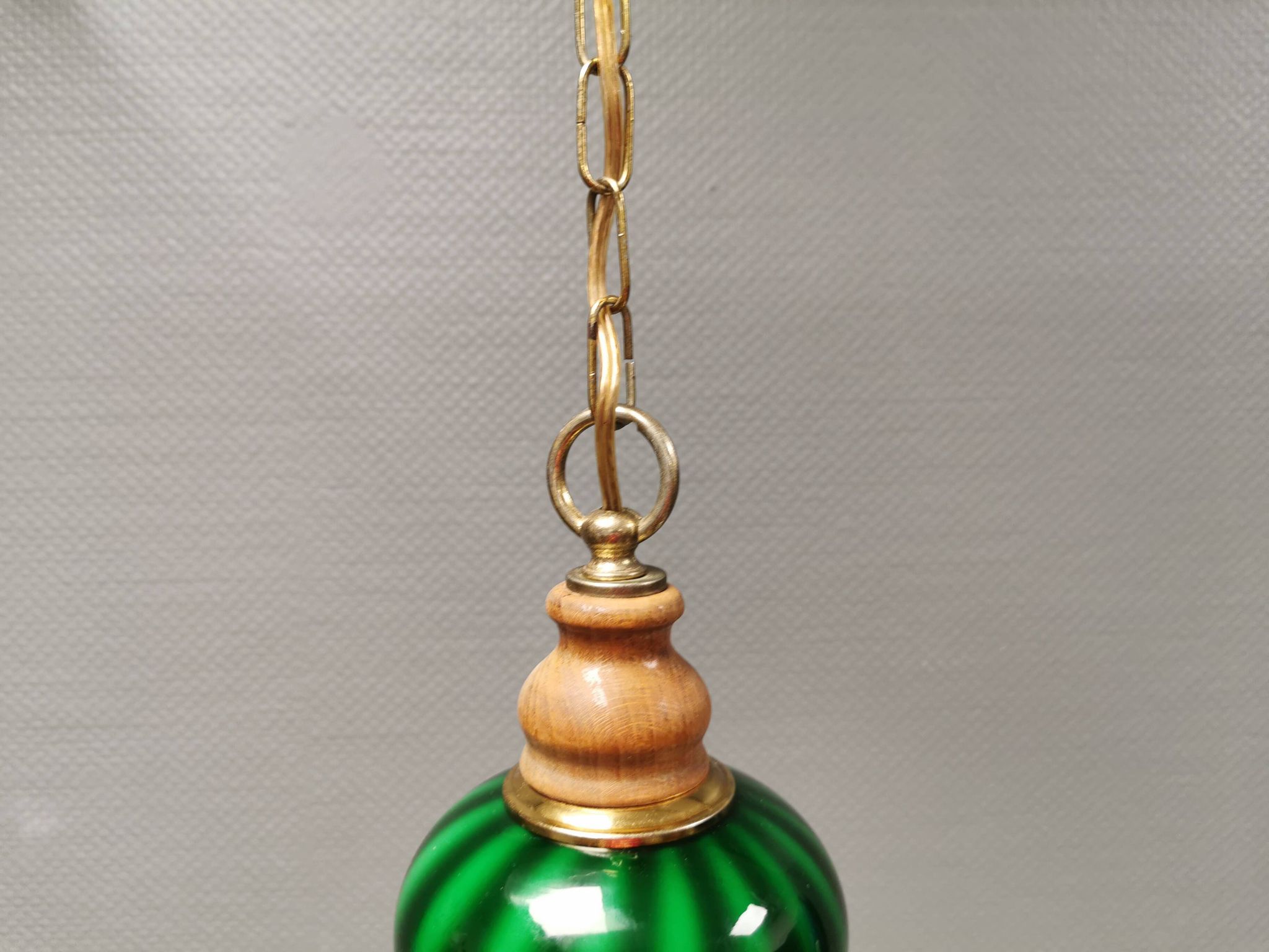 green hanging lamp in double layer glass (white inside) with wooden top and safety chain,