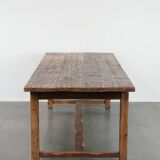 Magnificent and robust antique farmhouse dining table made of pine wood