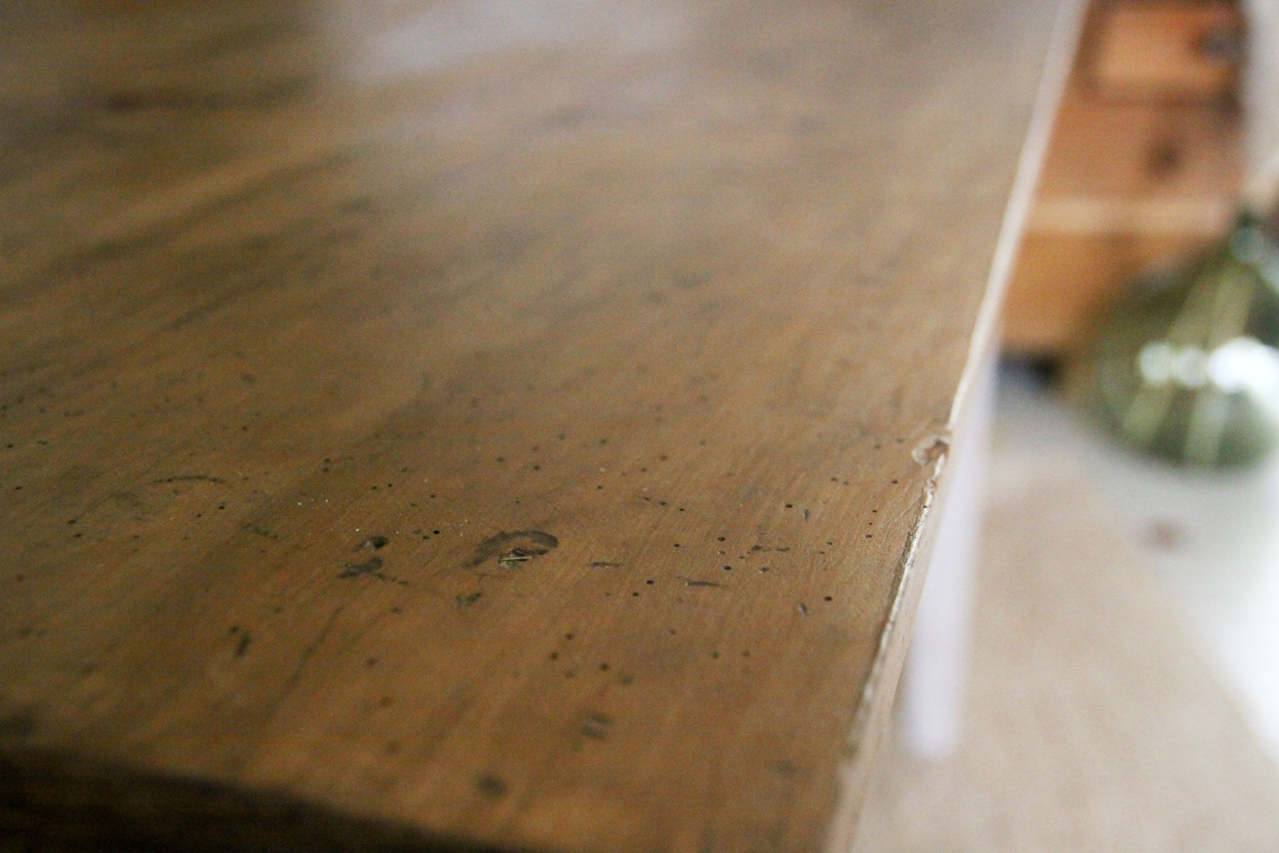 Patinated wooden dining table