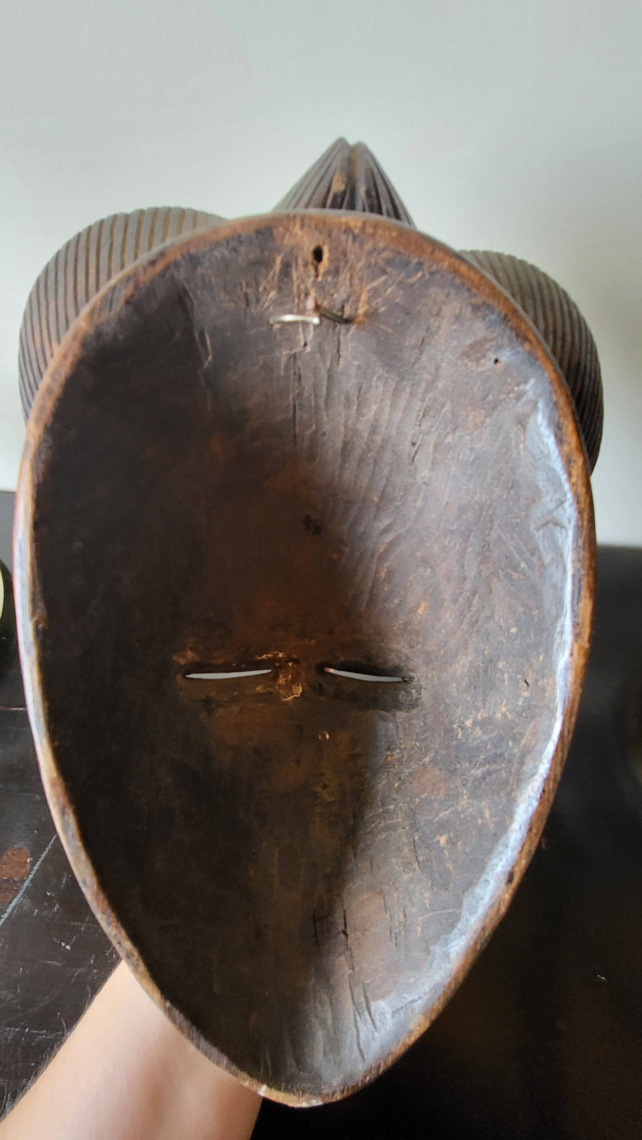 African mask carved from wood – ethnic decoration
