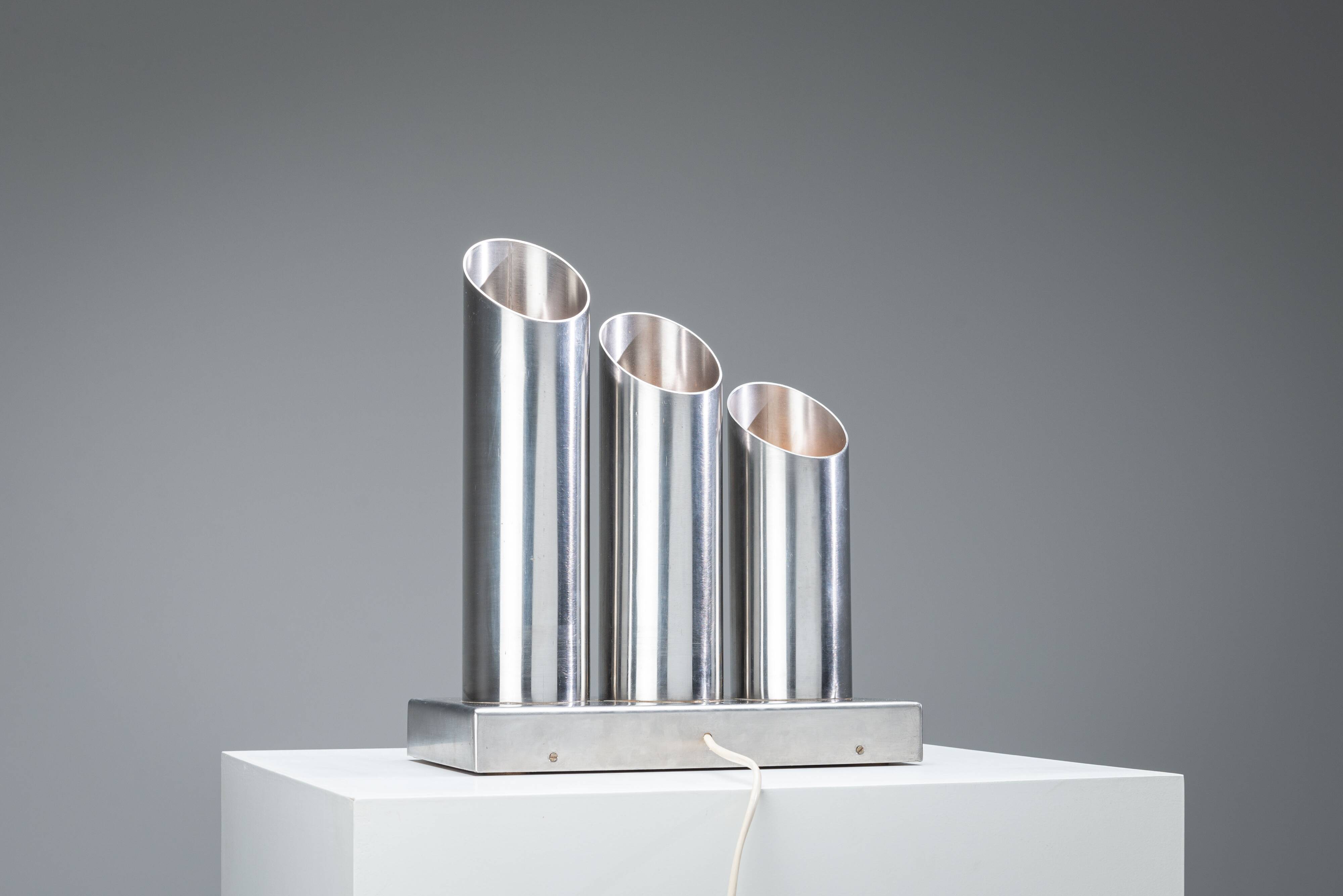 Triple column table lamp in stainless steel by Goffredo Reggiani