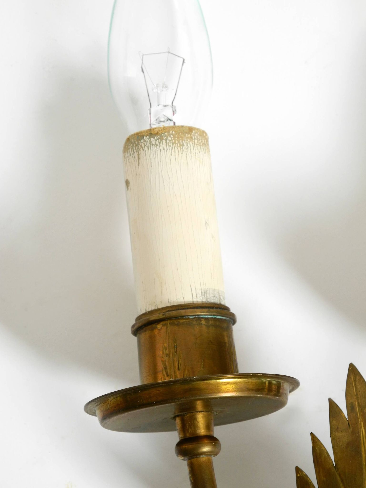 A pair of mid-century modern brass wall lamps by Vereinigte Werkstätten