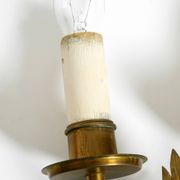 A pair of mid-century modern brass wall lamps by Vereinigte Werkstätten