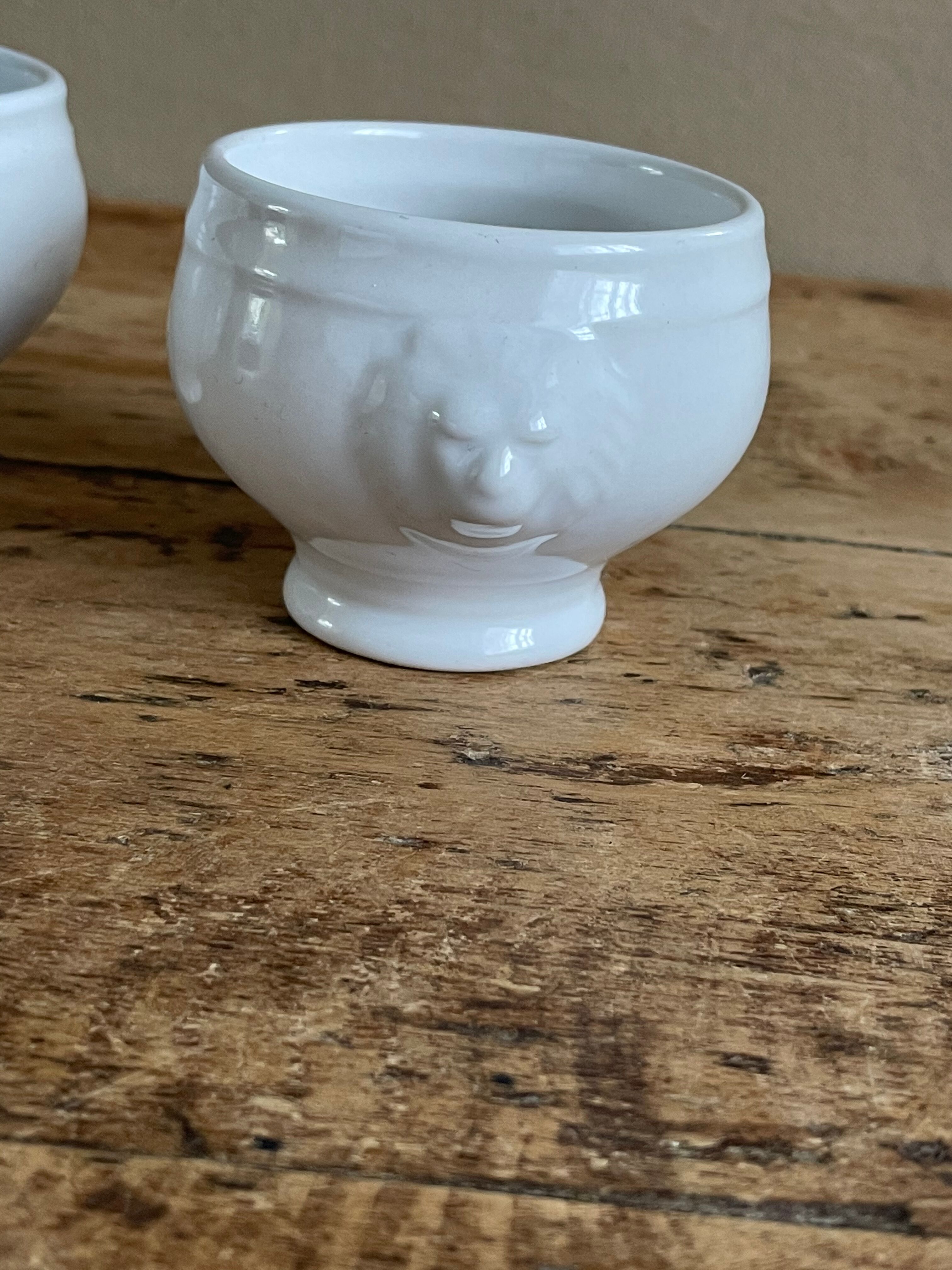 5 coupelles blanches tête de lion