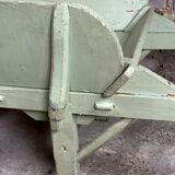 Antique wooden wheelbarrow