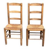 2 solid wood chairs in dark oak and high elephant straw