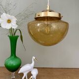 Suspension globe vintage en verre ambré bullé