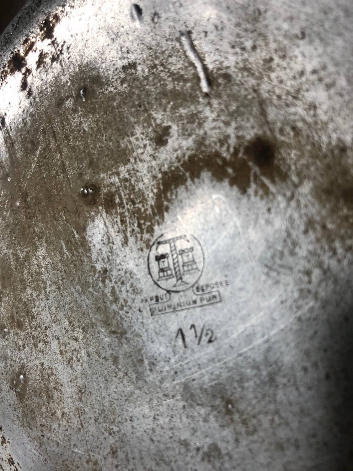 Old aluminum coffee maker, woven wicker handle