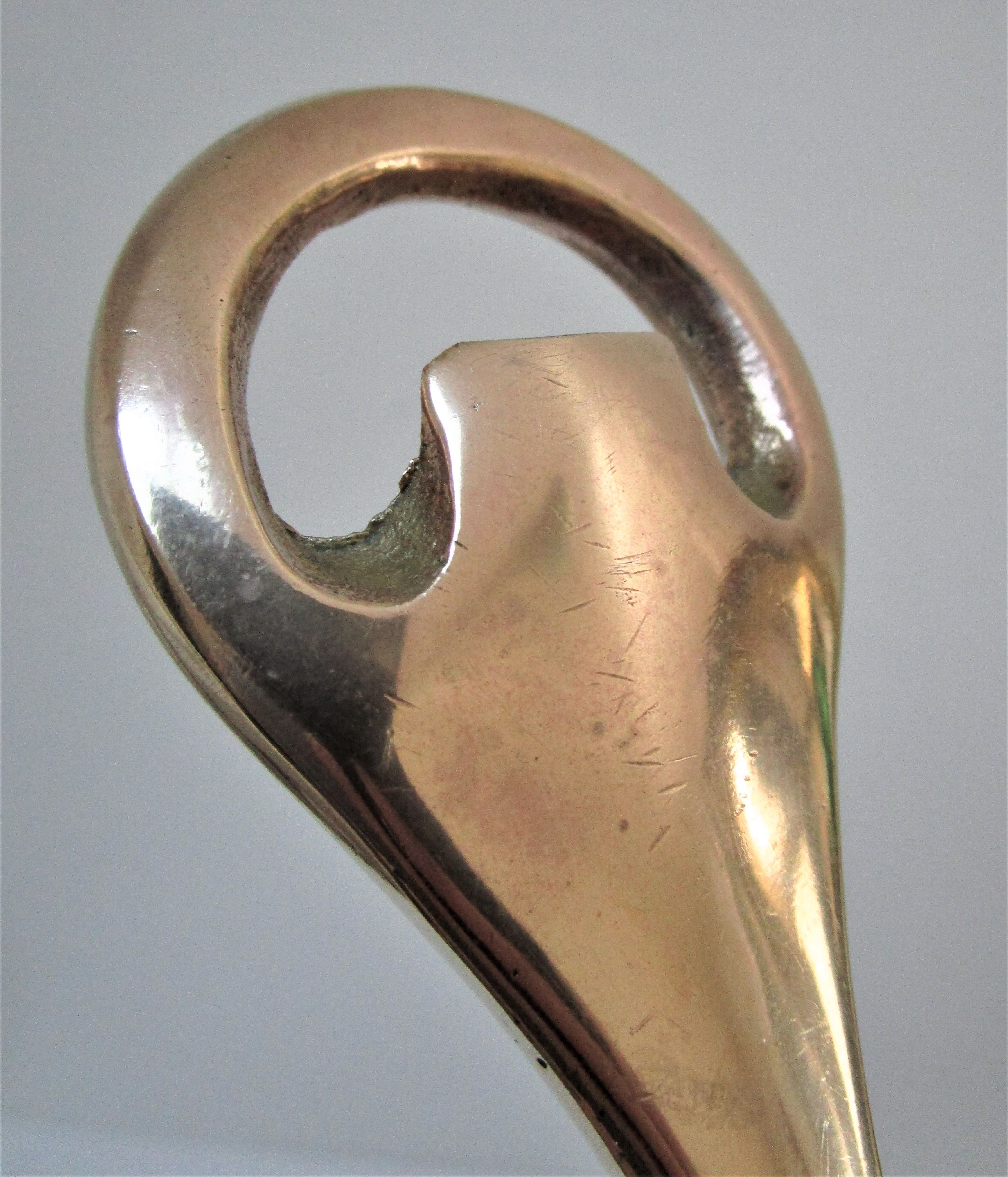 Modernist solid brass bottle opener by Carl Auböck