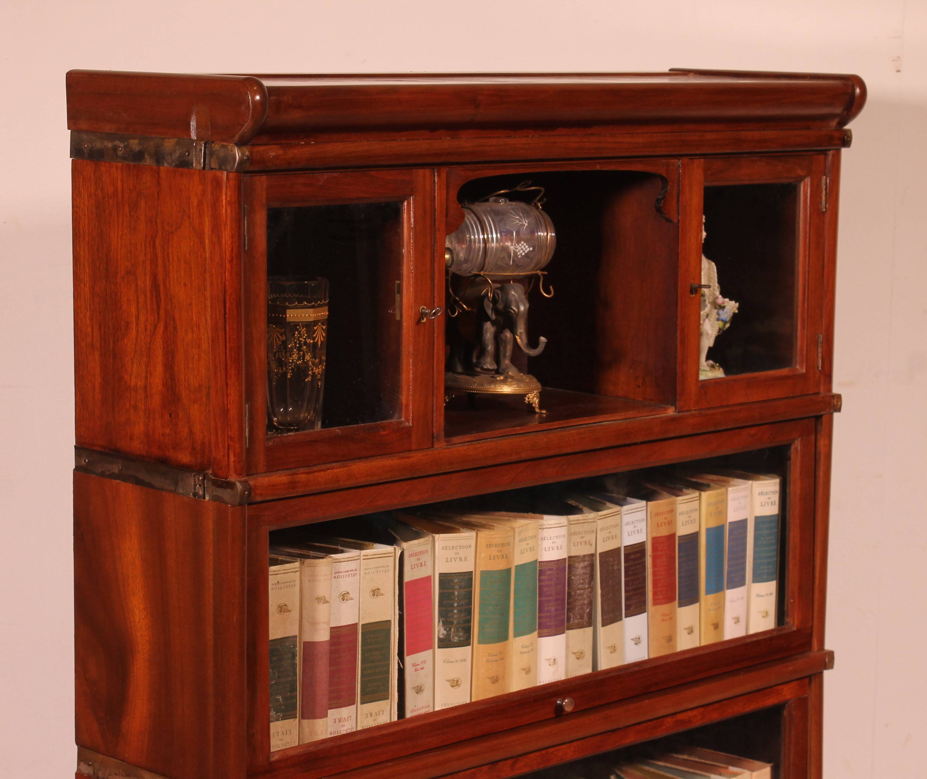 Globe Wernicke Library in Mahogany with 3 pieces and a small cabinet.