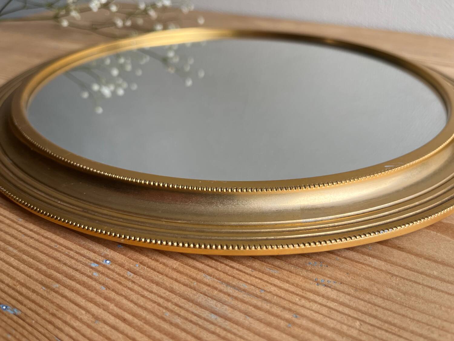 Vintage gold round mirror