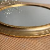 Vintage gold round mirror