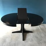 Extendable butterfly extension table