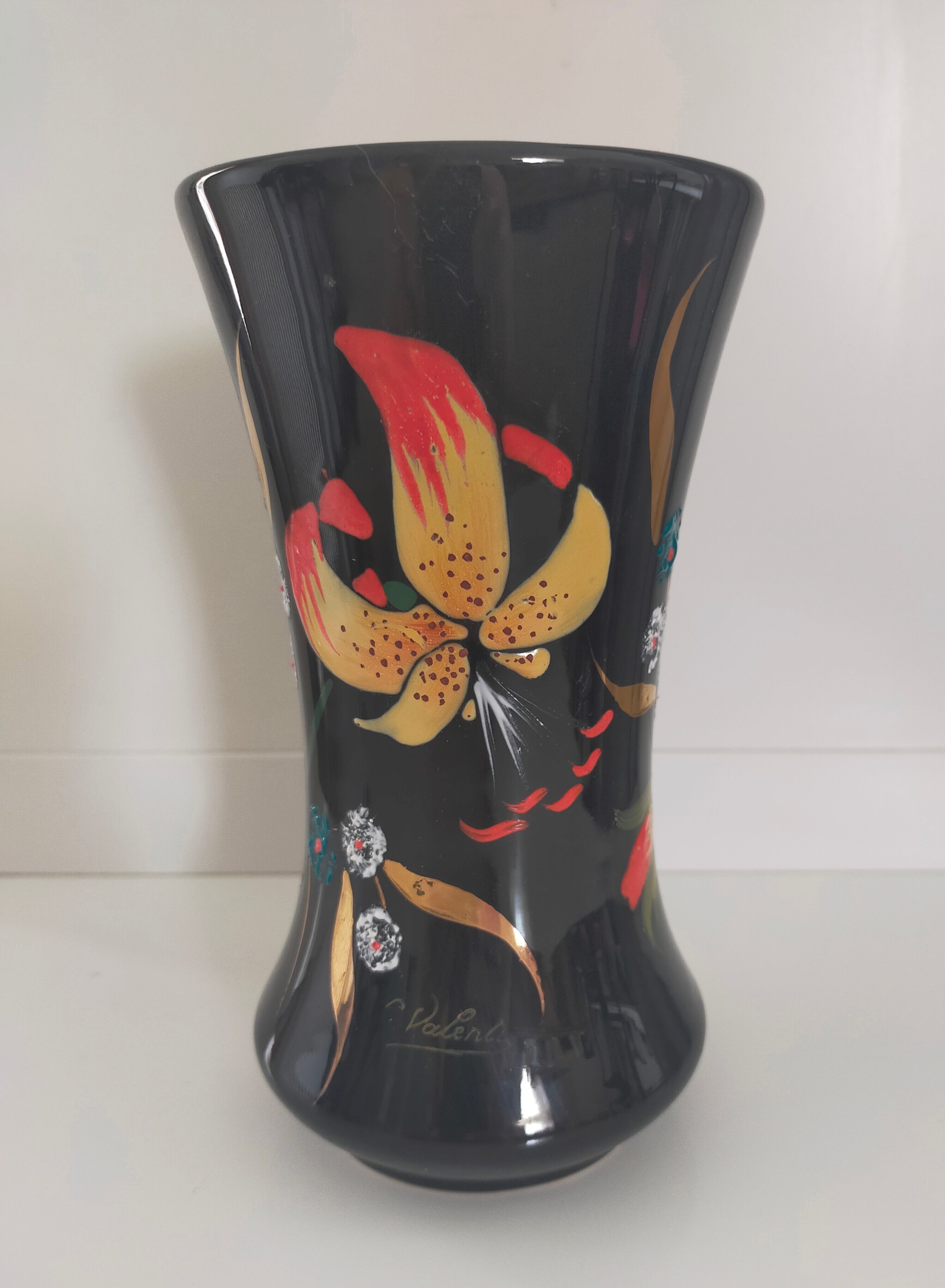 Longwy, Louis Valenti Black vase decorated with tiger lilies in polychrome enamels