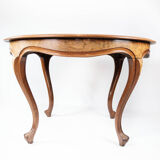 Round dining table of walnut, 1860s