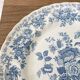 Four old blue plates