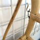 Rattan wall shelf