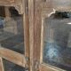 Antique glass-fronted buffet in Burmese teak