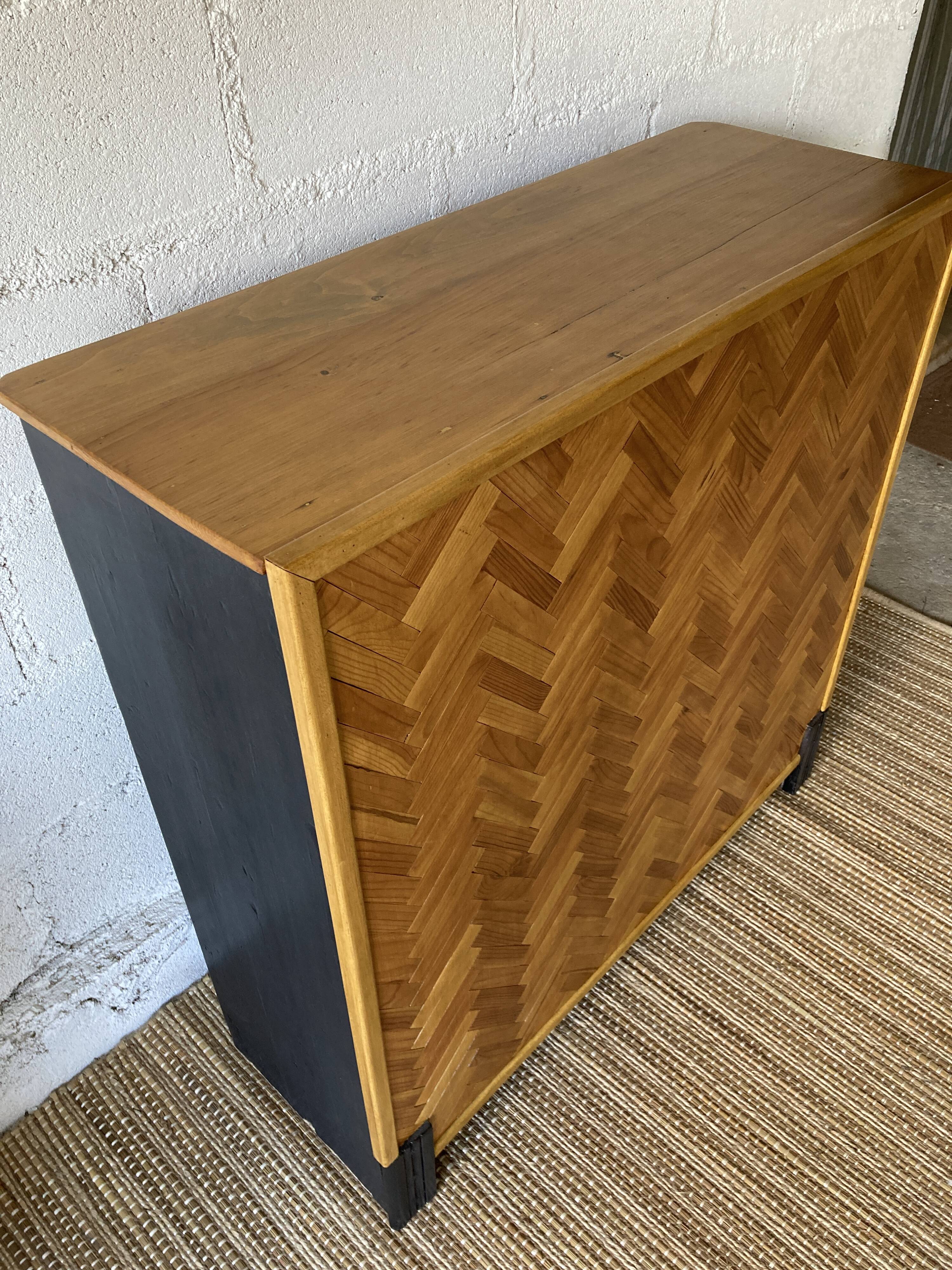 Bar cabinet with chevron installation