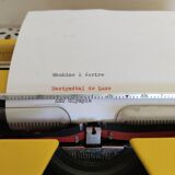 Vintage yellow portable typewriter, working, AEG, new ribbon