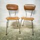 Pair of vintage chrome and leatherette chairs