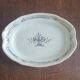 Faience dish "black ass"