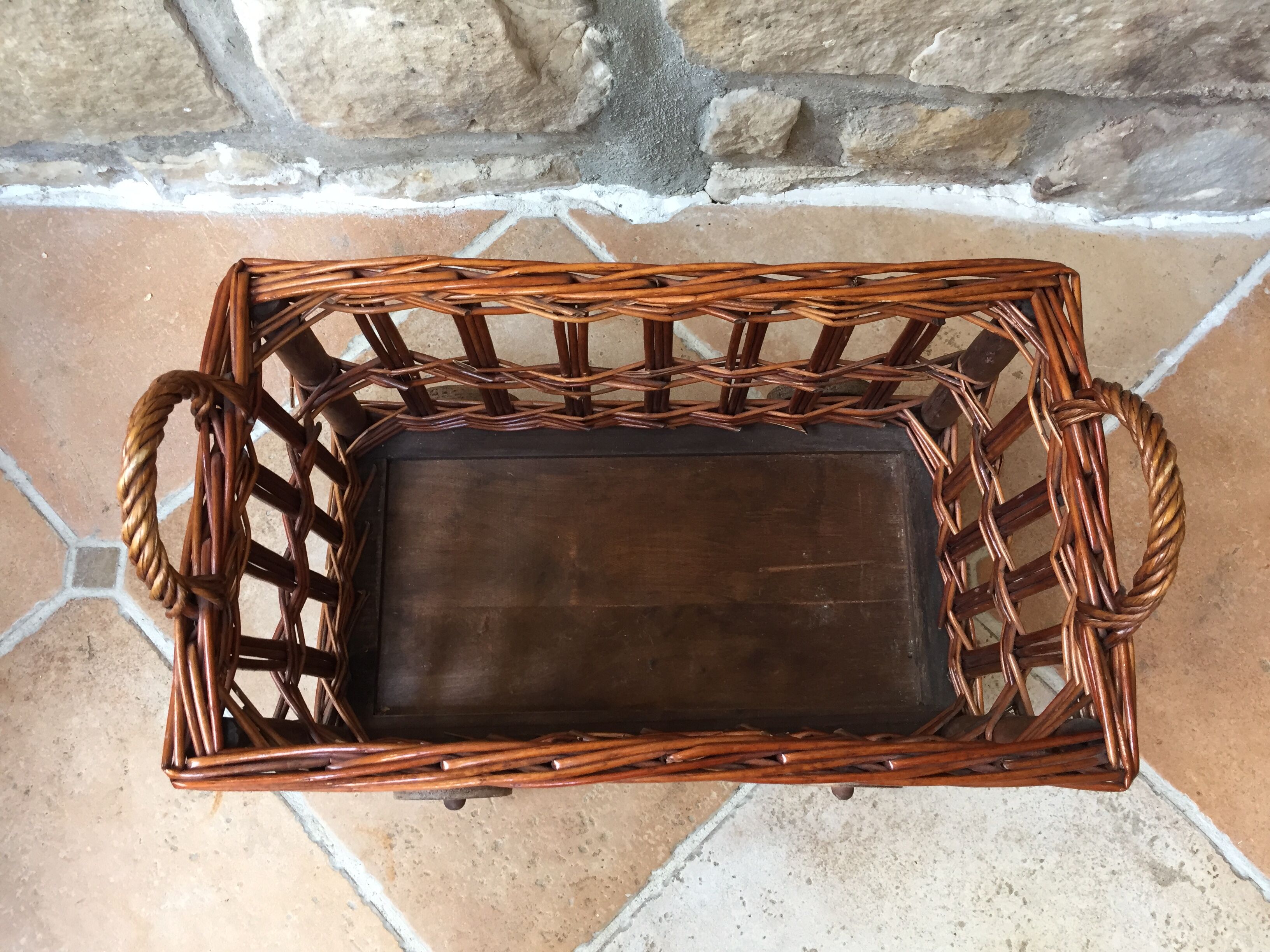 Small wicker wheeled cart