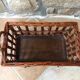Small wicker wheeled cart