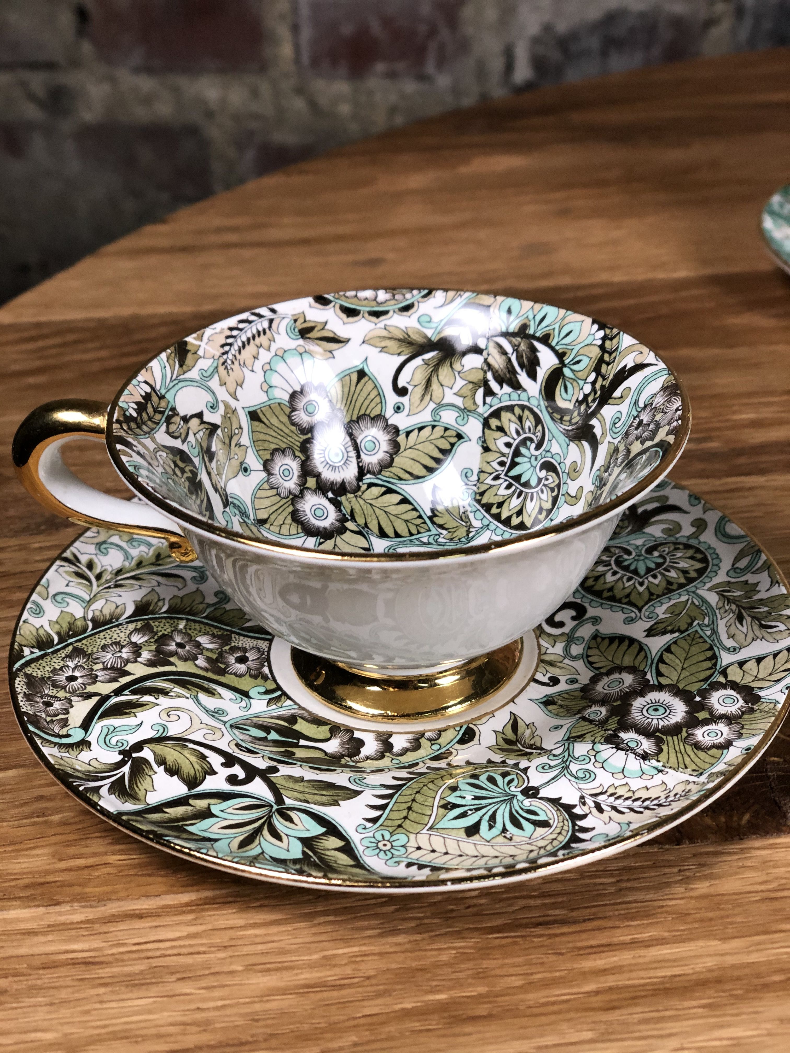 Porcelain coffee service multicolored and gilded cashmere designs signed BM France