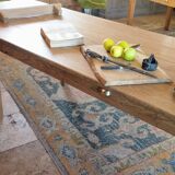 Solid oak farmhouse table with central drawer and extension