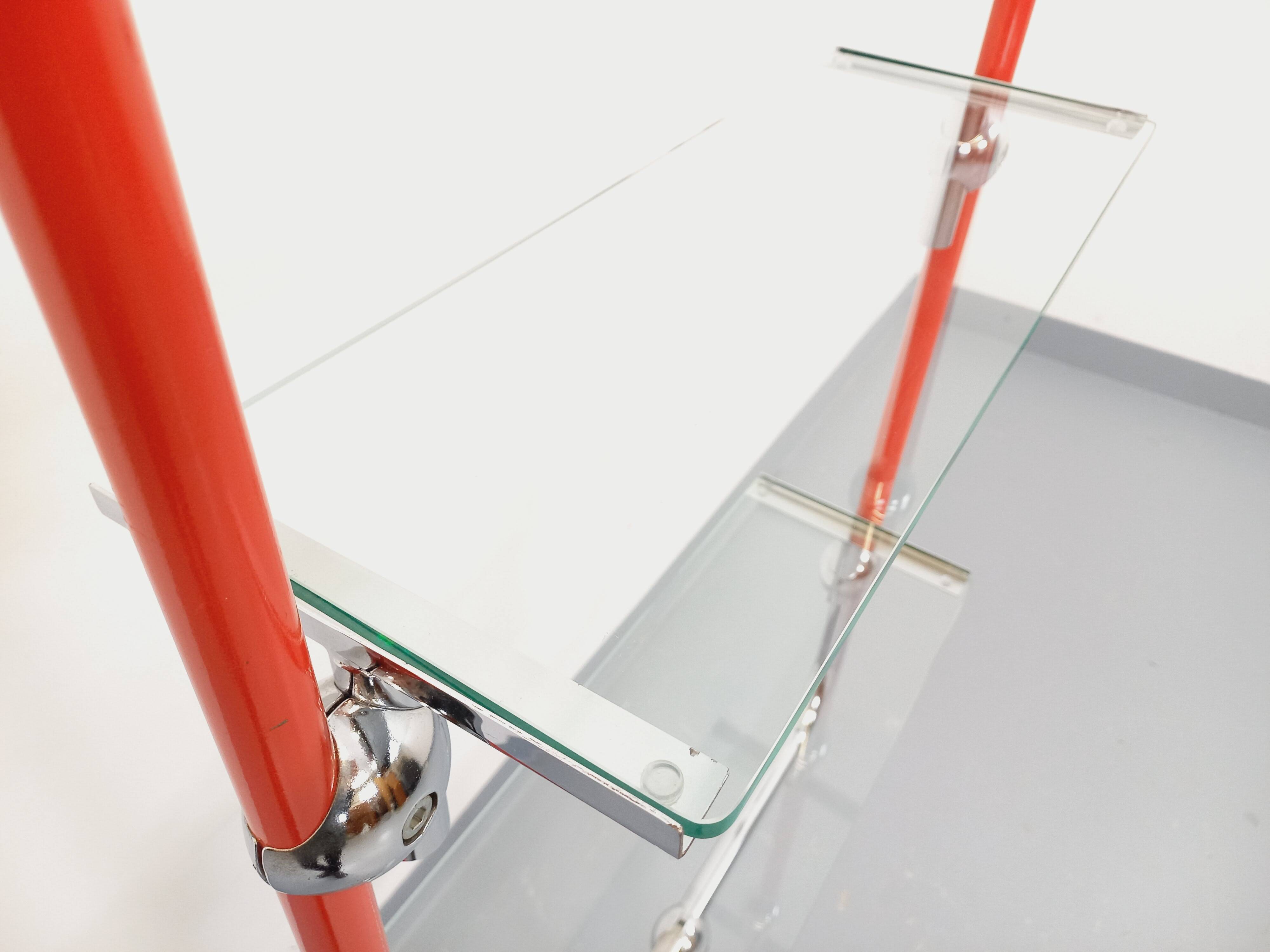 Modular bookshelf in vintage Bauhaus style, red metal, chrome.