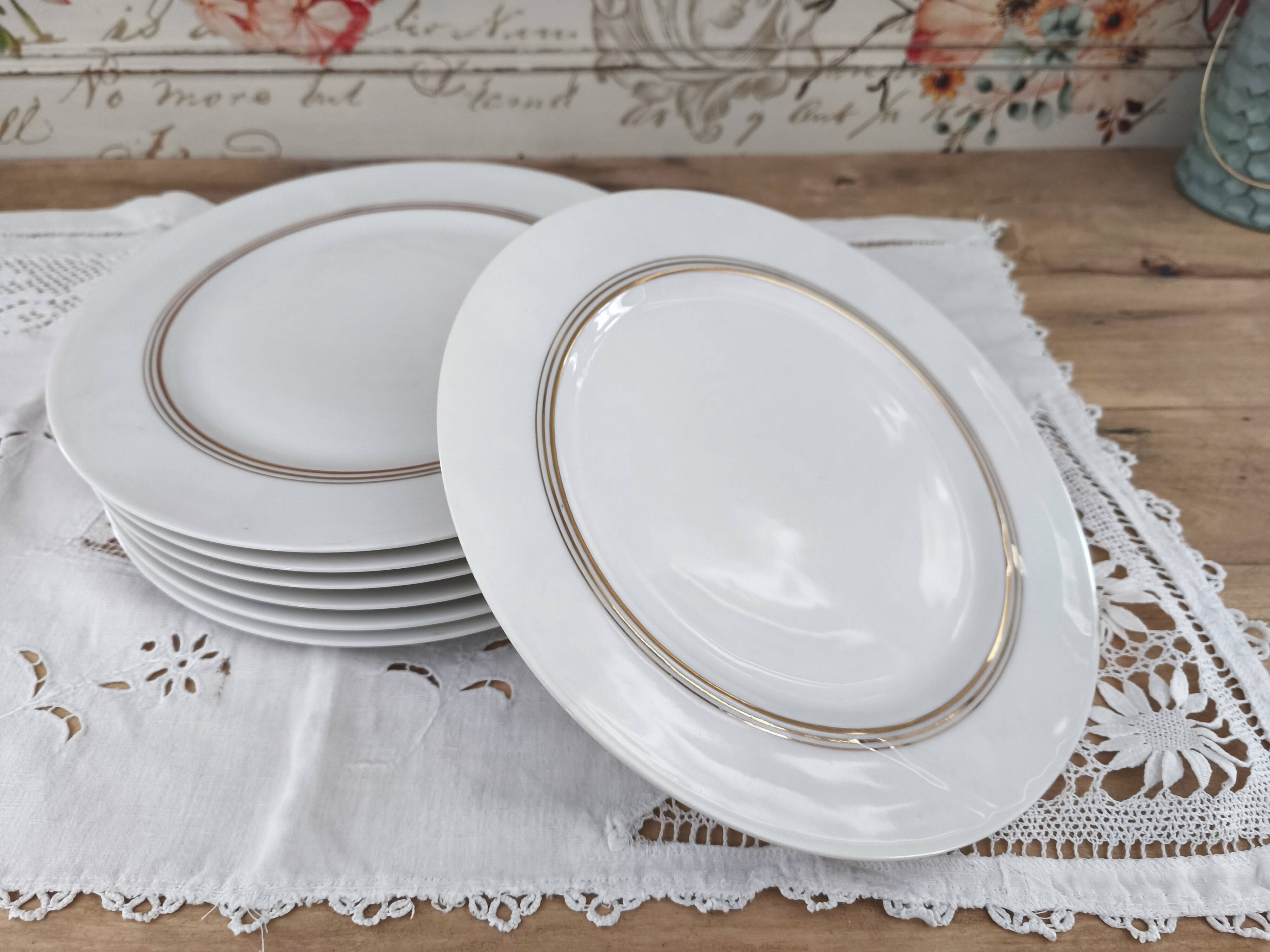 Set of 7 Limoges porcelain dinner plates from Maison Charles Ahrenfeldt