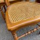 Set of 4 Louis-Philippe medallion chairs in wood with caned seats, 1970s.